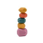 A wooden building block in the shape of coloured stones.