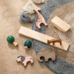A set of wooden Animal and Dinosaur balance games with giraffes, elephants and zebras.