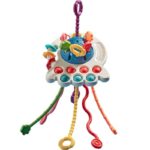 A colorful baby sensory toy with lots of buttons.