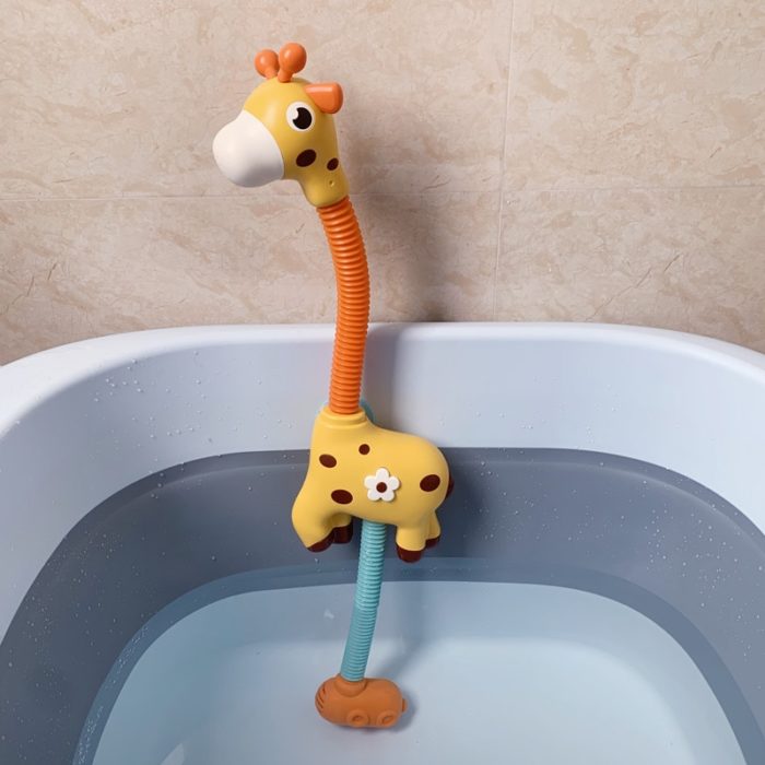 A Giraffe toy sits in a bathtub, Water Jet Sprinkler - Giraffe.