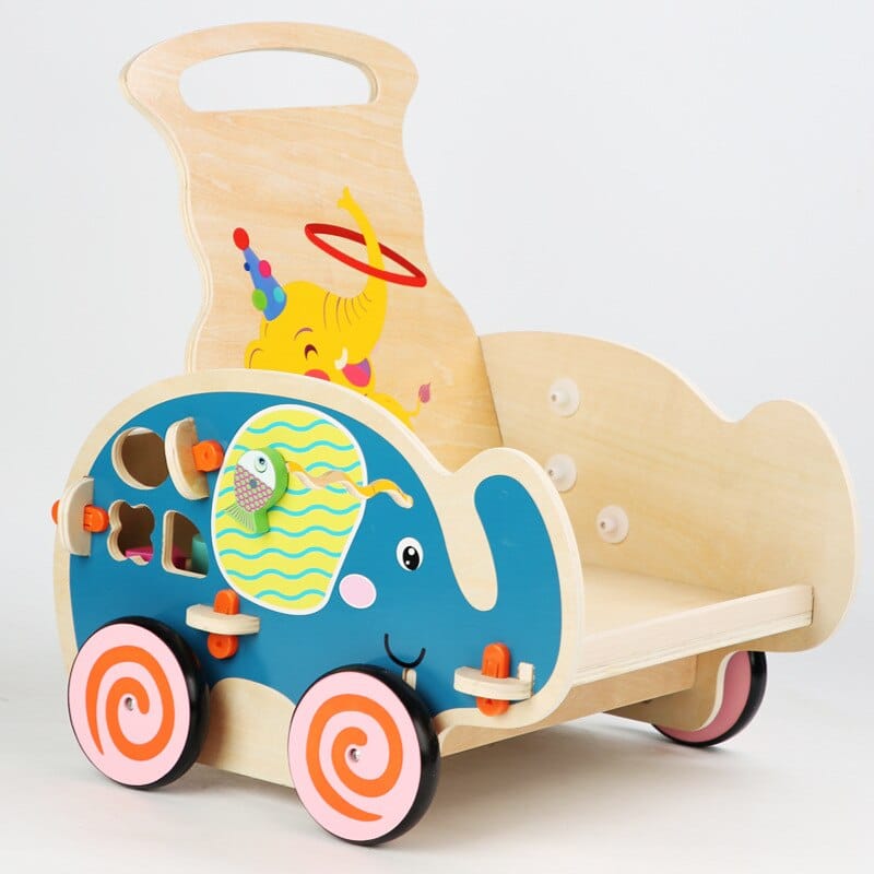 Un Chariot de Marche Pousseur - Éléphant en bois avec un éléphant coloré.