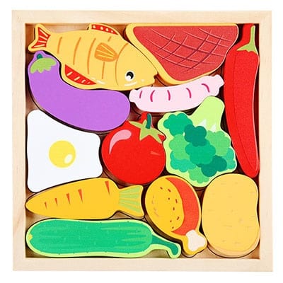 A wooden Tangram Cubes Pastel box filled with a variety of foods.