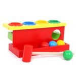 4-Color Wooden Hammer Game: A wooden toy with a hammer and balls in 4 colors.