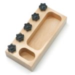 A tray with five Vissers Real Tools for Kids buttons.