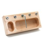 A wooden stand with Real Kids' Screw-On Tools and nuts specially designed for children.