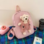 A Personalized Teddy Bear Backpack for Boys and Girls in pink.