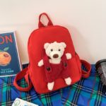 A Personalized Teddy Bear Backpack for Boys and Girls with a teddy bear.