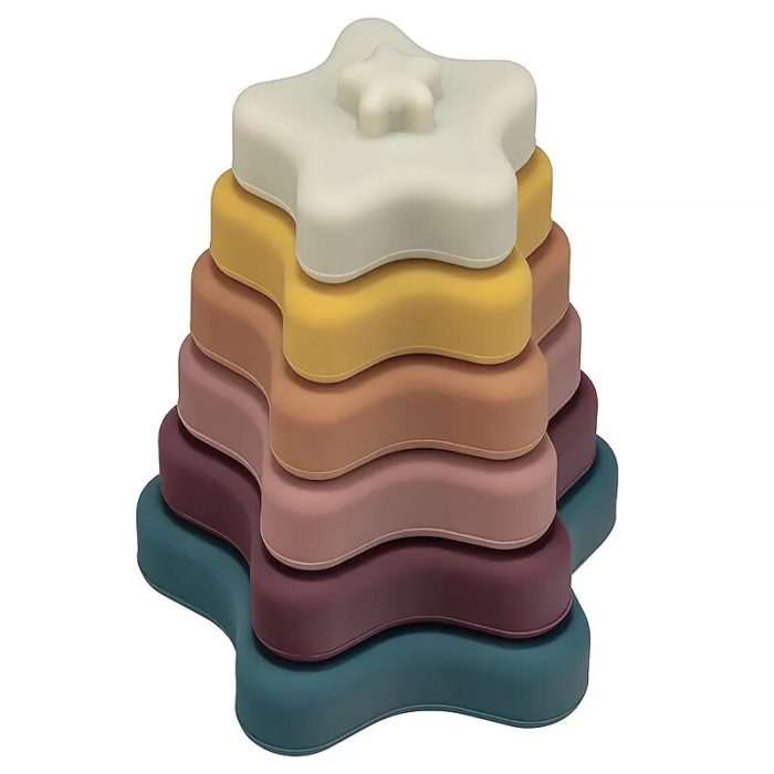 A stack of colorful stacking toys on a white background.