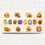 Découvrez le « Puzzle Personnalisé Prénom en Bois - Un souvenir unique », un puzzle en bois représentant les lettres d'Halloween qui forment le mot « LEONARDO ». Il est orné de citrouilles, de chats, de fantômes et d'autres motifs effrayants, ce qui le rend parfait pour ajouter une touche personnelle à vos célébrations festives.